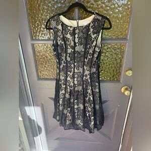 Established 1962 Elegant Black Lace Overlay Dress